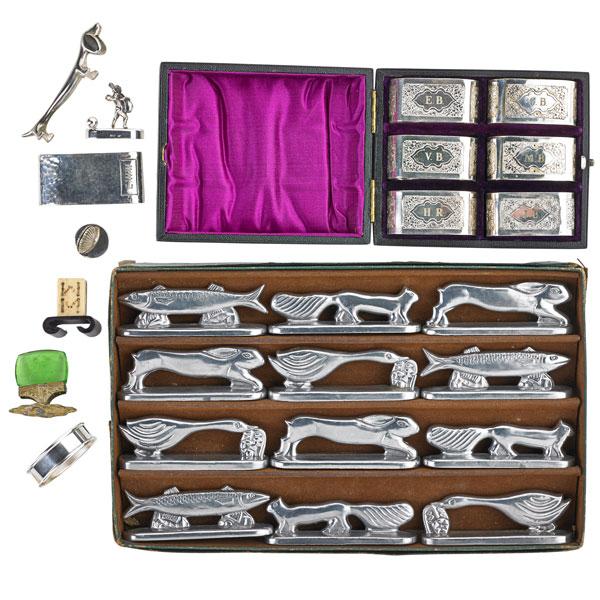 Appraisal: PLACECARD HOLDERS AND NAPKIN RINGS Sixty-eight pieces Collection of place