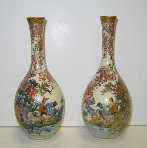 Appraisal: PAIR OF JAPANESE SATSUMA VASES Bottle form painted with ducks