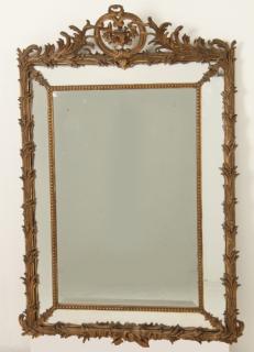 Appraisal: TH C FRENCH CARVED GILTWOOD CUSHION MIRROR WITH BEVEL GLASS