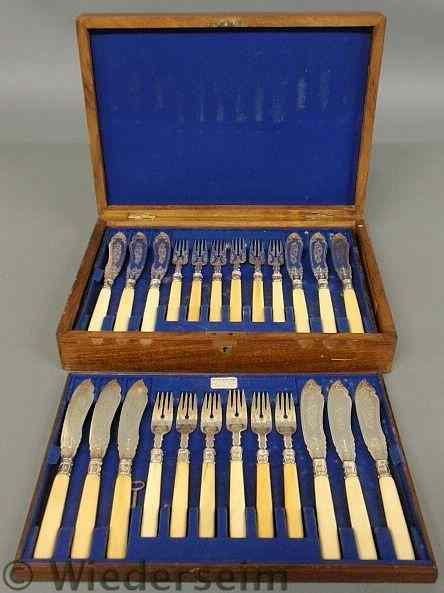 Appraisal: Silver and bone handled fish service for eighteen knives l