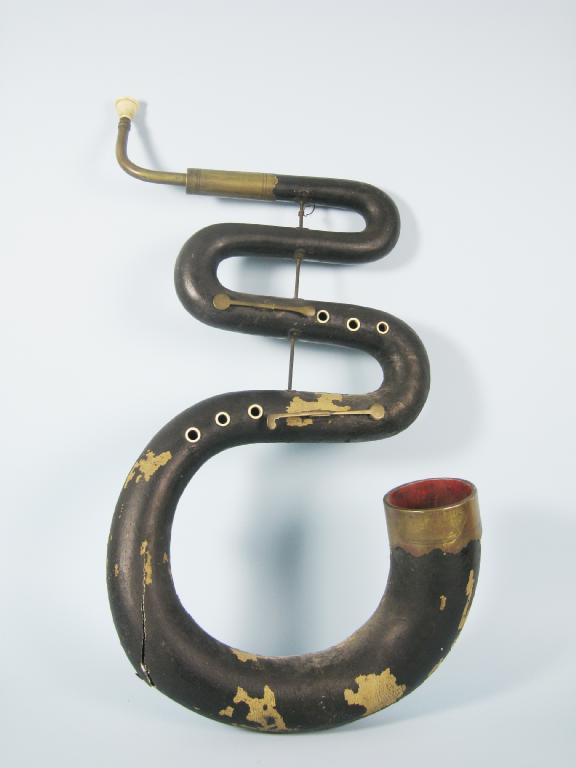 Appraisal: An 'S' shaped wind instrument made from lacquered moulded canvas