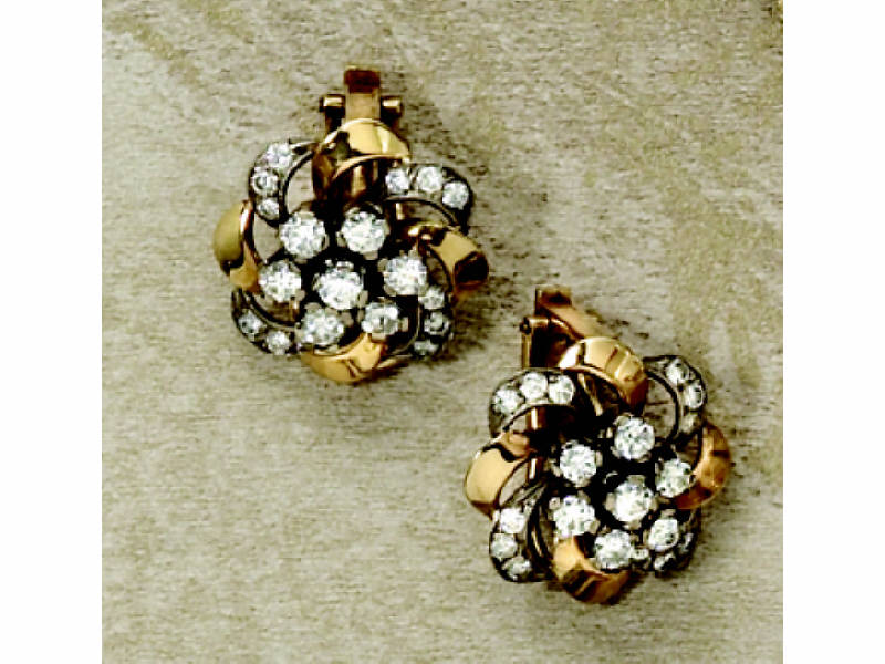 Appraisal: RETRO DIAMOND EARRINGS k yellow gold Retro diamond cluster clips