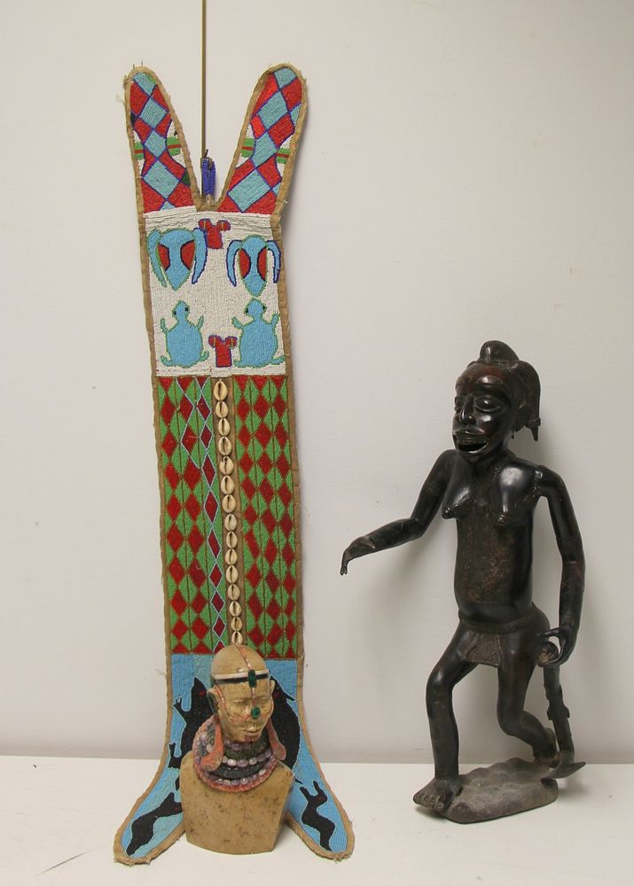 Appraisal: African Bronze Figure Stone Head And A Beaded Hanging From