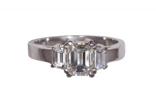 Appraisal: Diamond and platinum ring Diamond and platinum ring centering emerald-cut