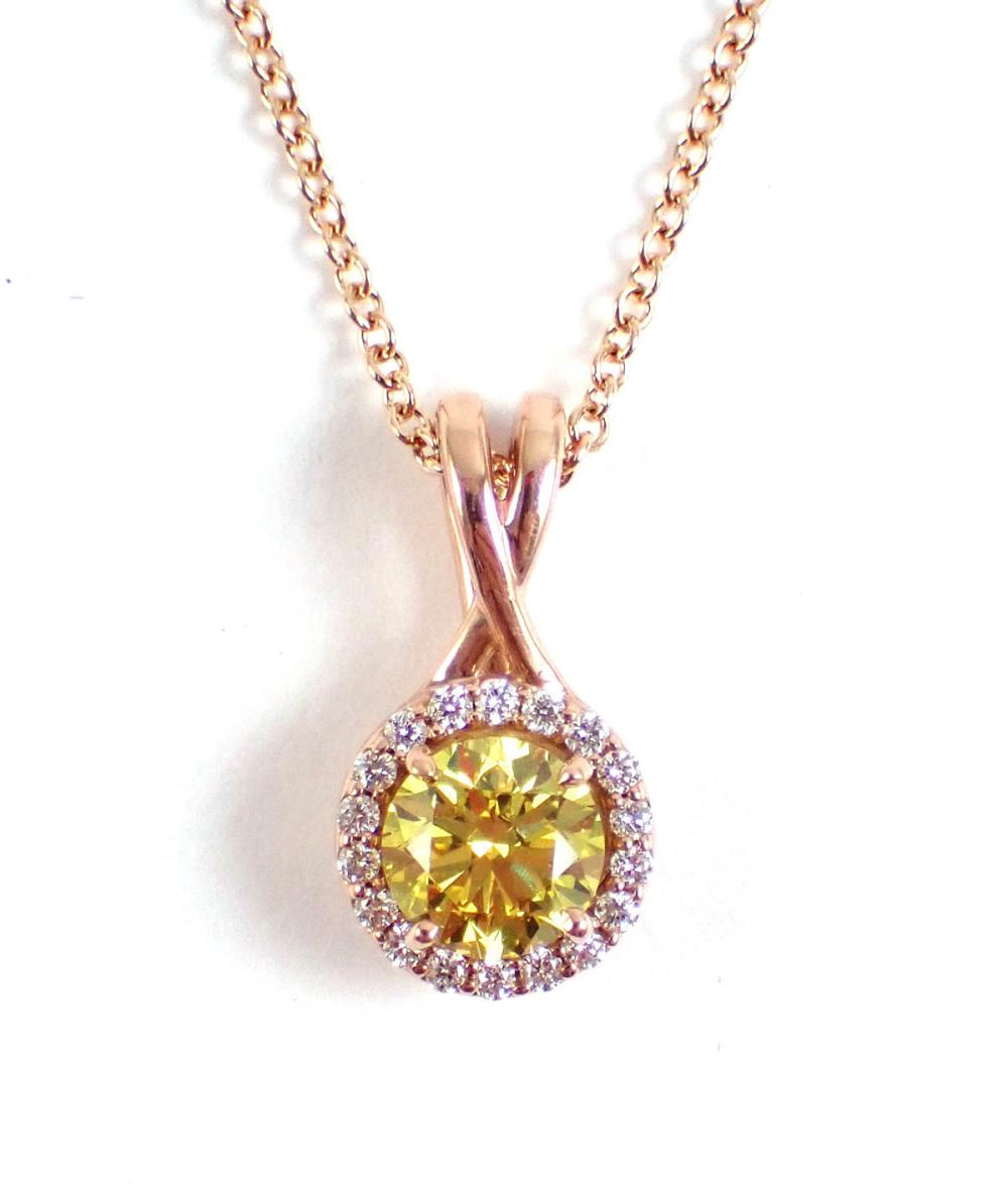 Appraisal: CANARY DIAMOND WHITE DIAMONDS AND FOURTEEN KARAT ROSE GOLD PENDANT