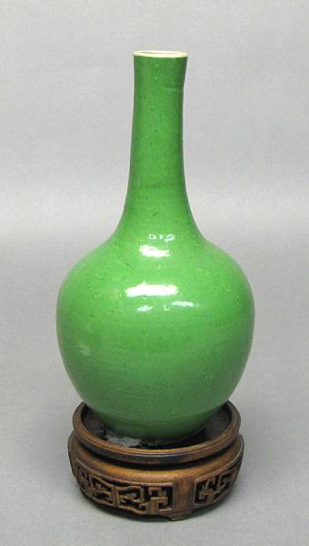 Appraisal: A small green glazed porcelain stick neck vase th Century