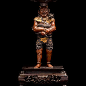 Appraisal: A Patinated and Gilt Bronze Figure of Oni MEIJI PERIOD