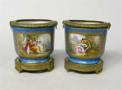 Appraisal: Pair of Sevres style porcelain and gilt bronze mounted cachepots