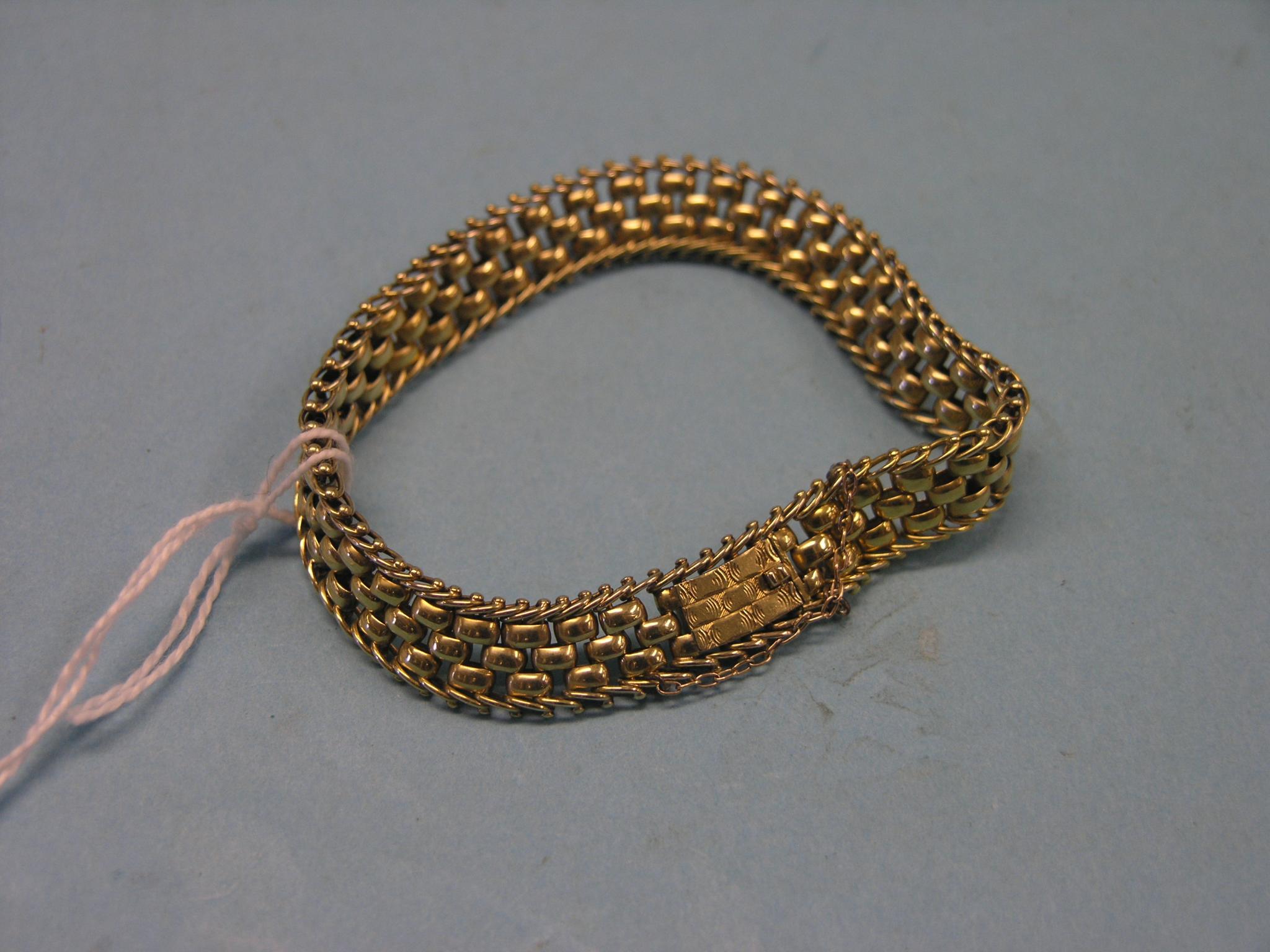 Appraisal: A yellow metal bracelet grams