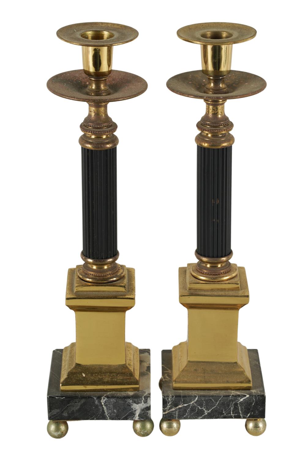 Appraisal: PAIR OF EMPIRE STYLE COLUMNAR CANDLESTICKSbrass-finish metal painted metal and