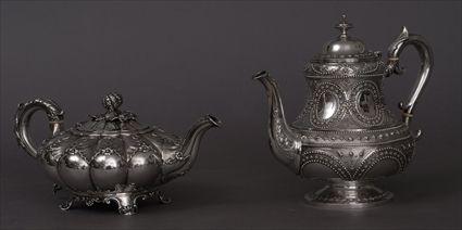 Appraisal: WILLIAM IV SILVER MELON-FORM TEAPOT AND A VICTORIAN ARMORIAL TEAPOT