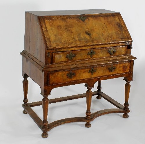 Appraisal: A Queen Anne walnut bureau on stand with banded fall