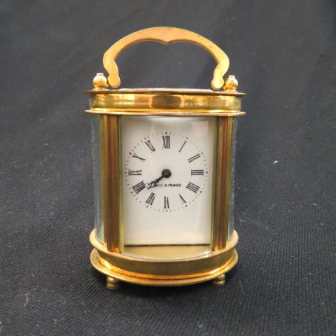 Appraisal: French Carriage Clock Roman numeral dial open view escapement working