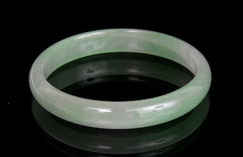 Appraisal: A Translucent Jadeite Bangle in Pale Celadon Green Color Chinese