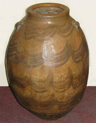 Appraisal: A large glazed earthenware pot inches cm high