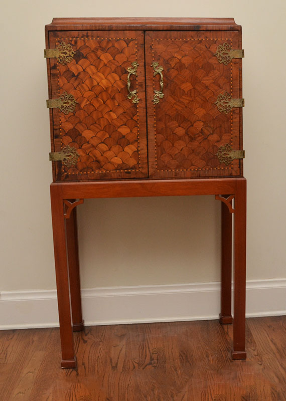 Appraisal: SWEDISH DOOR PARQUETRY INLAID CHEST ON STAND Parquetry decoration all