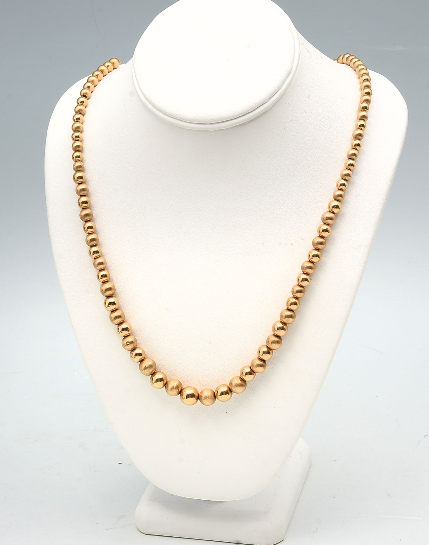 Appraisal: K GRADUATED BEAD NECKLACE K yellow gold graduated - mm