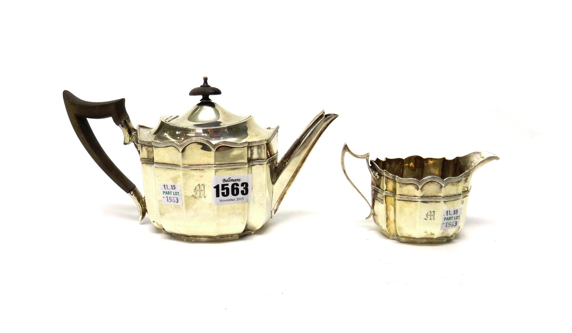 Appraisal: A silver teapot and a matching milk jug each of