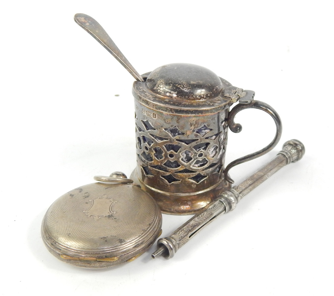 Appraisal: A Victorian silver mustard pot with pierced decoration blue glass