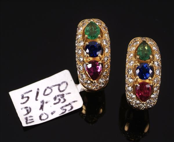 Appraisal: A pair of multi gem set ear clips the circular