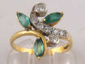 Appraisal: An carat gold emerald and diamond ring emeralds approx mm