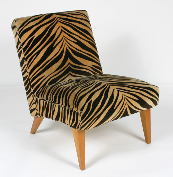 Appraisal: Upholstered lounge chair with faux zebra hide mid century possibly