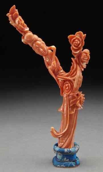 Appraisal: Chinese Qing carved red coral Guanyin International buyers should note