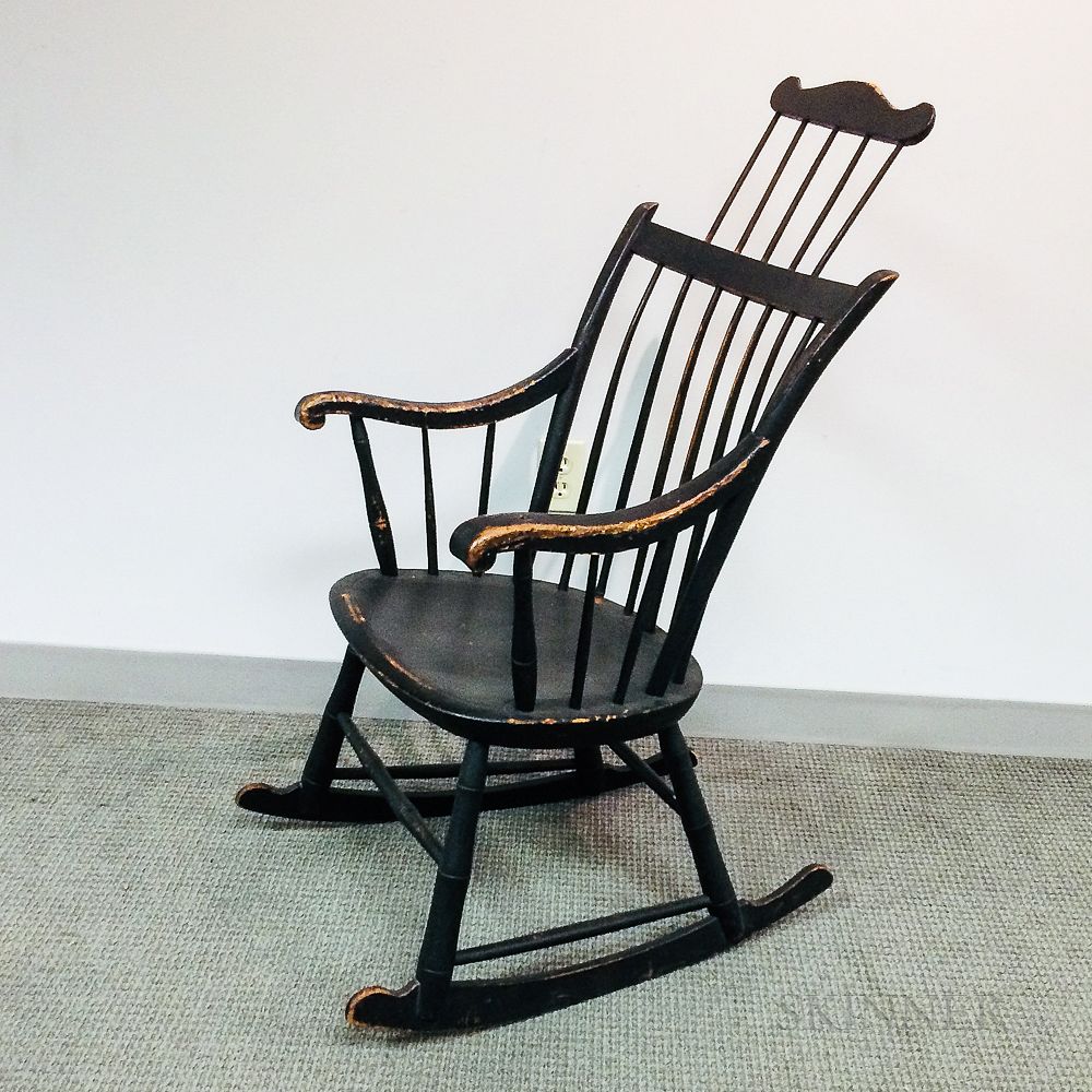 Appraisal: Black-painted Comb-back Windsor Armed Rocking Chair Black-painted Comb-back Windsor Armed