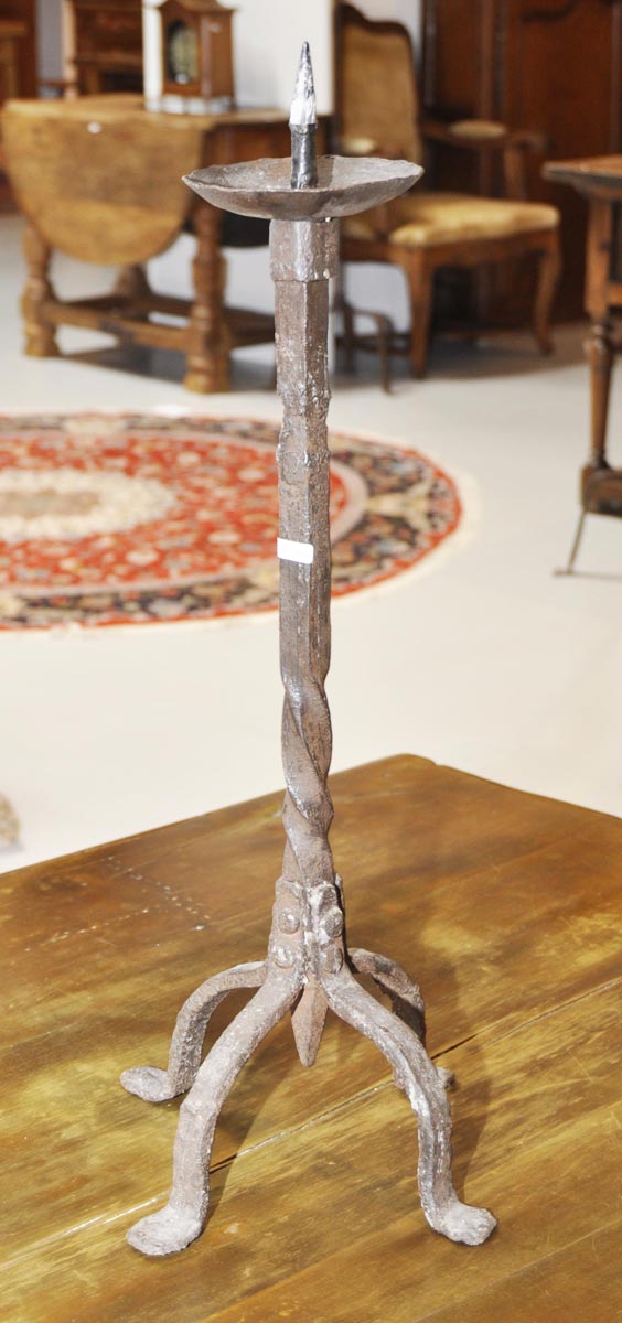 Appraisal: SMALL CANDLESTICK Baroque style Wrought iron twisted shaft on legs