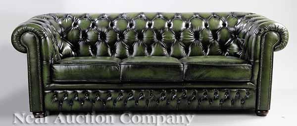 Appraisal: An English Chesterfield Sofa of typical form with tufted back