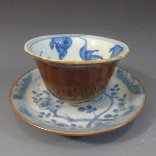 Appraisal: ANTIQUE CHINESE BLUE WHITE CAFE AU LAIT PORCELAIN CUP SAUCER