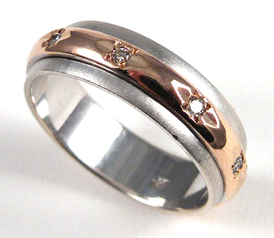 Appraisal: DIAMOND AND FOURTEEN KARAT GOLD RING white and rose gold