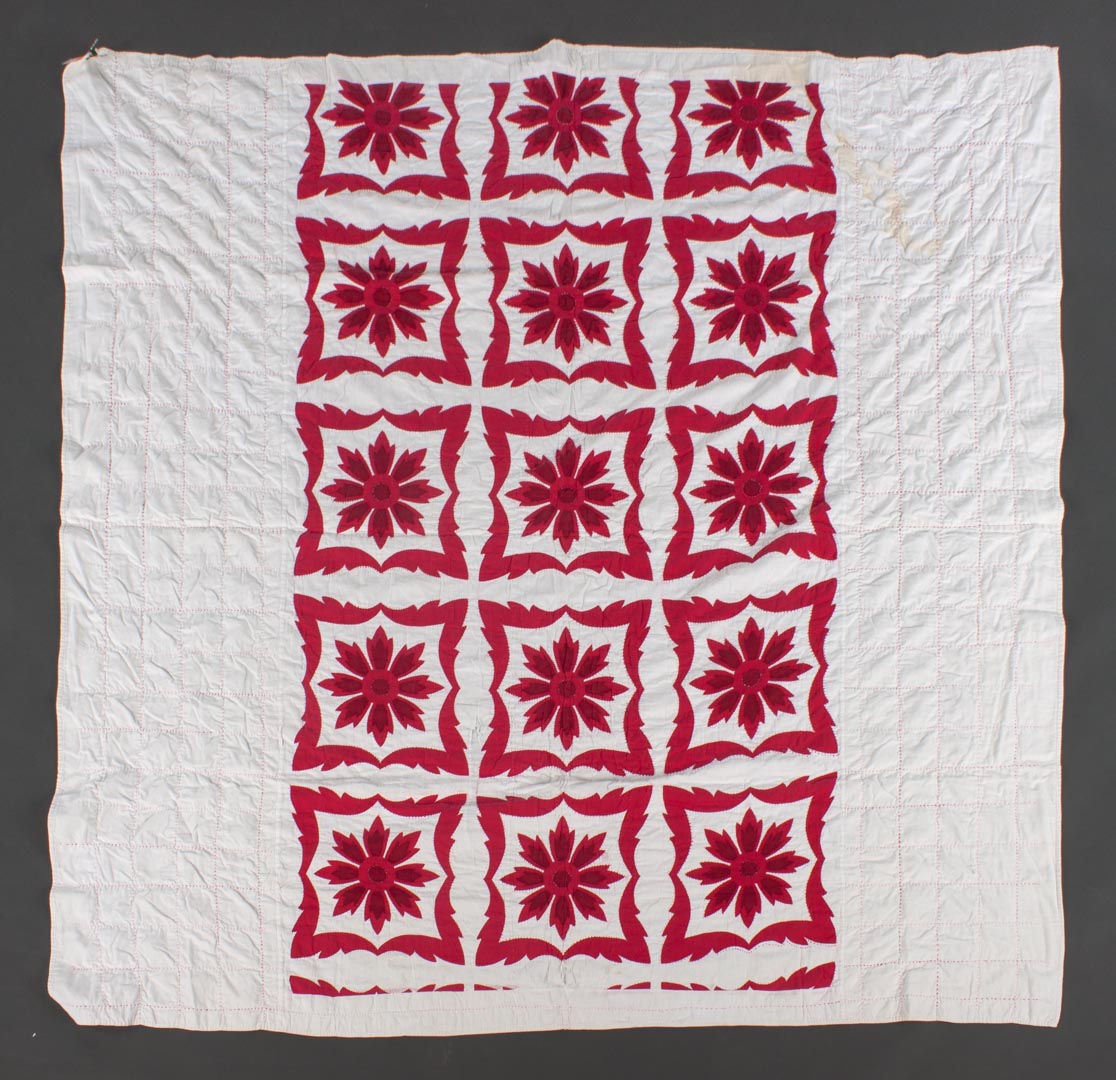 Appraisal: Flour sack patchwork quilt circa 's with red daisy pattern