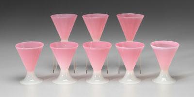 Appraisal: Eight Steuben goblets Rosalene pattern hourglass shape pink tops with