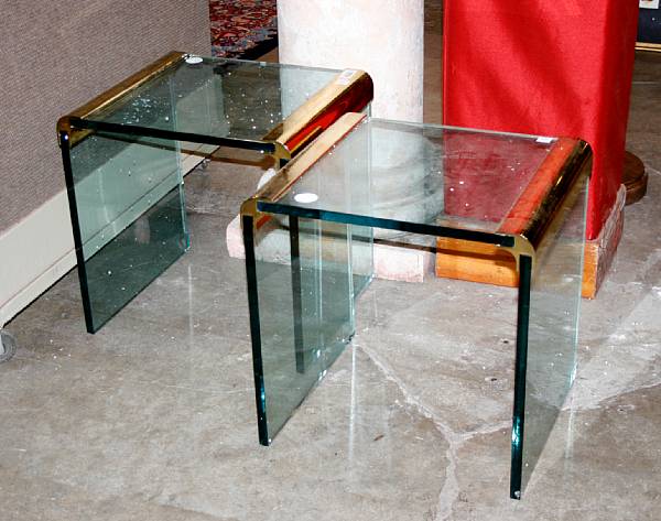 Appraisal: A pair of Contemporary brass and glass end tables height