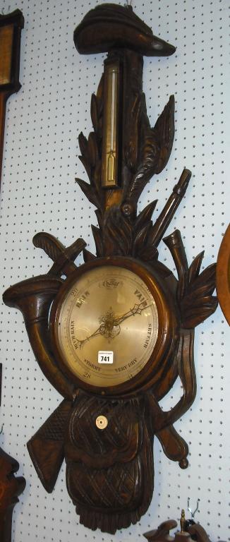 Appraisal: Black Forest carved oak barometer thermometer the silvered scale within