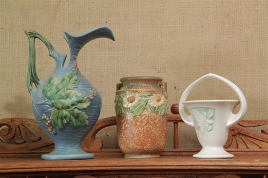 Appraisal: THREE PIECES OF ROSEVILLE POTTERY A ewer in blue Bushberry