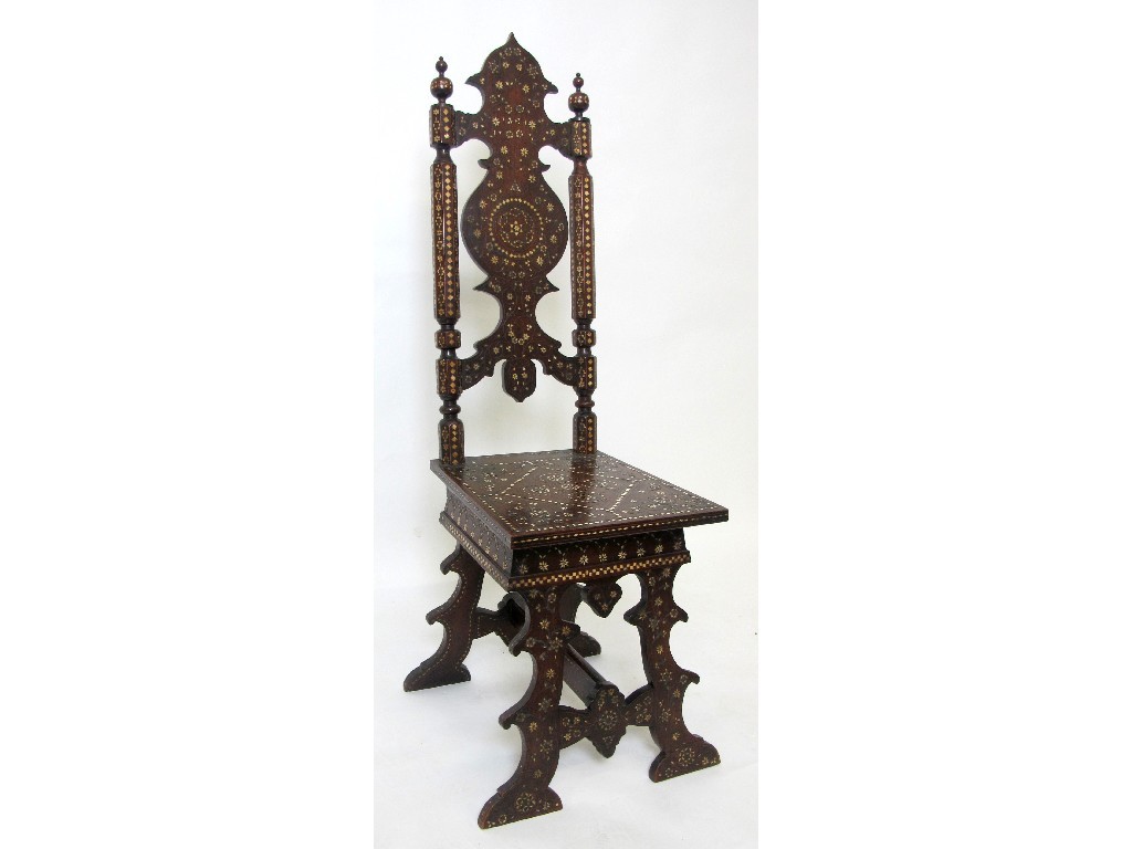 Appraisal: A Damascus hardwood bone inlaid hall chair the shaped back