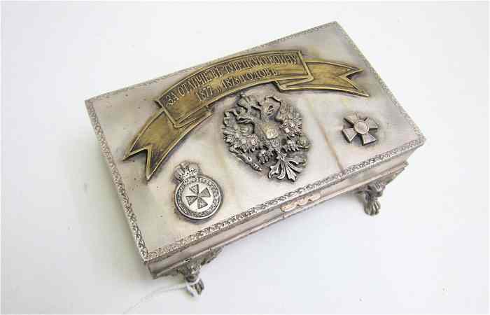 Appraisal: RUSSIAN SILVER-PLATED MILITARY OFFICER'S COVERED BOX having a miniatures of