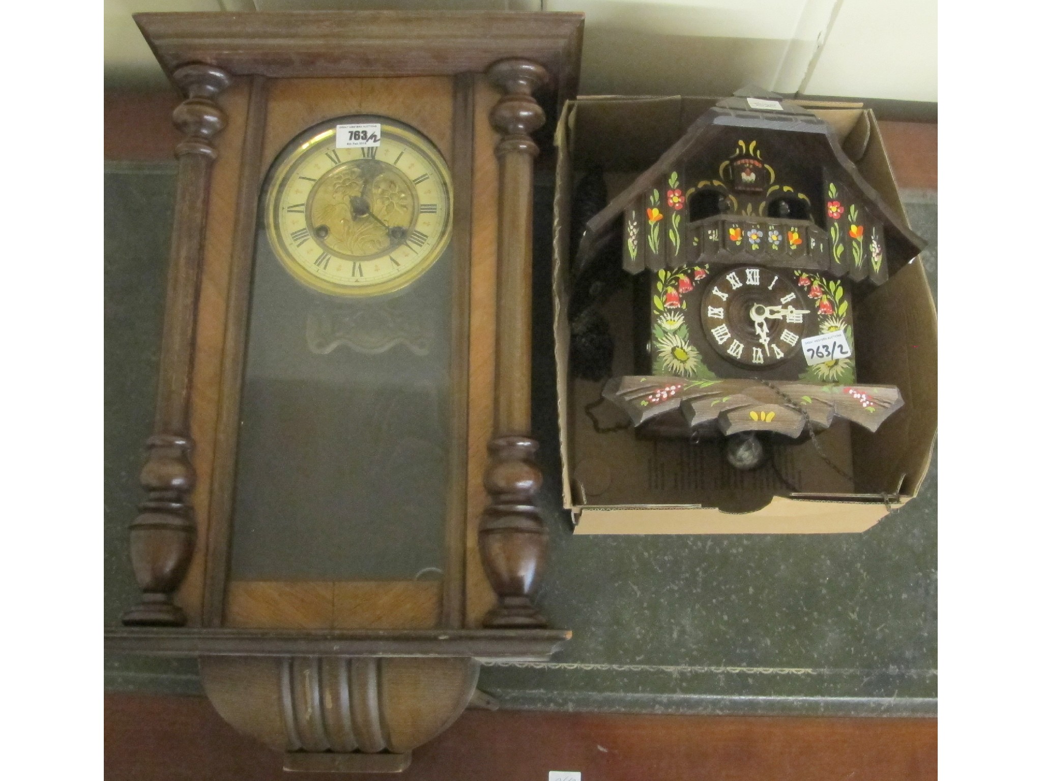 Appraisal: A wall clock and a cuckoo clock