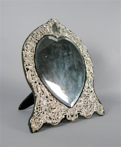 Appraisal: Dominick and Haff sterling silver repousse framed mirror mid th