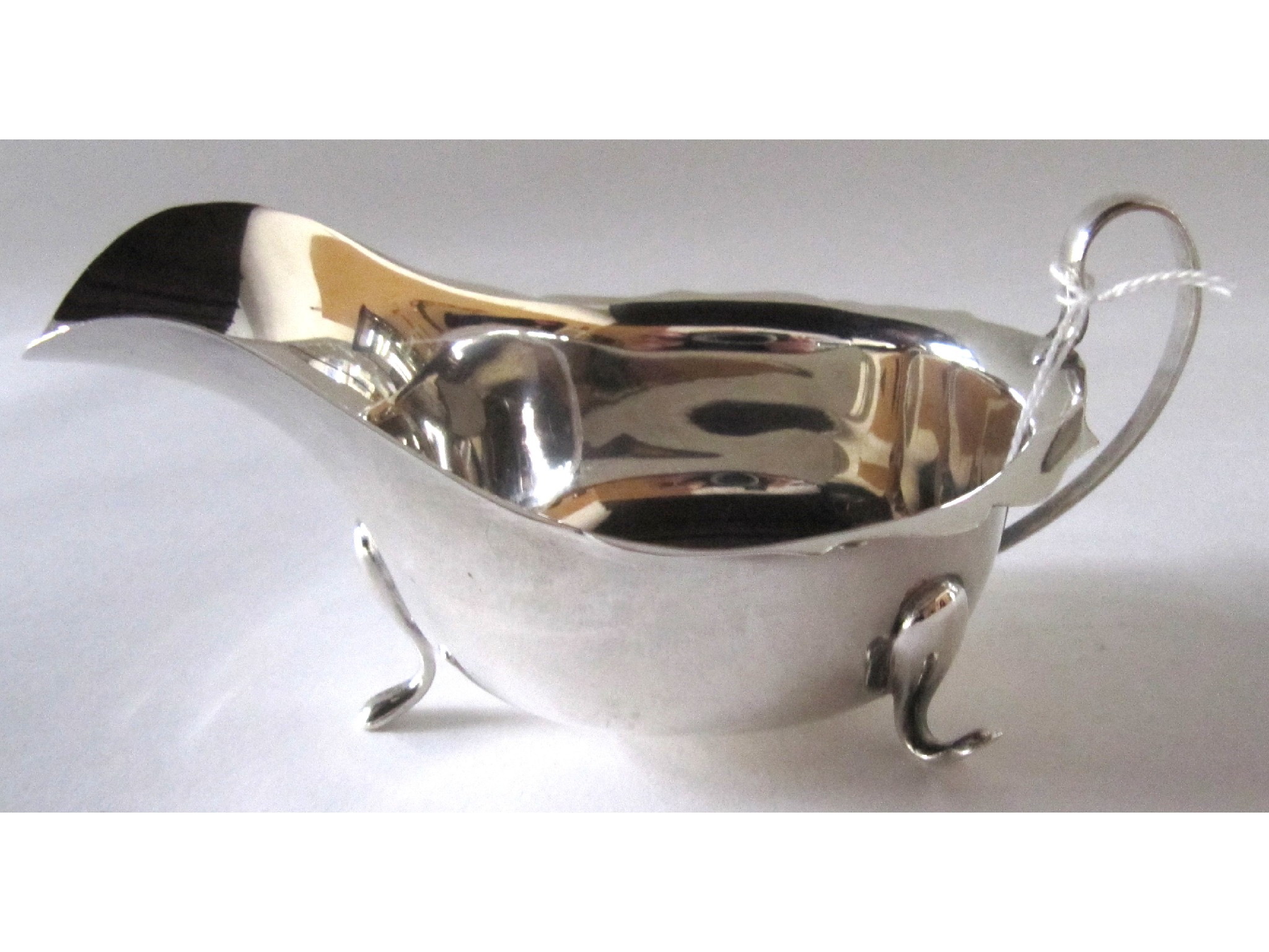 Appraisal: A silver sauceboat Sheffield