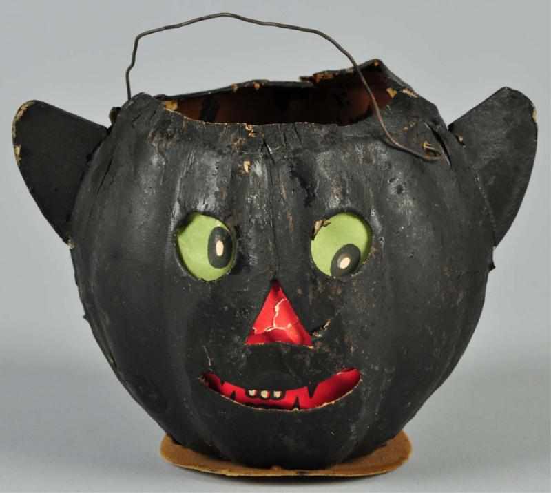 Appraisal: Black Cat Jack-O-Lantern Description With annealed ears and original paper