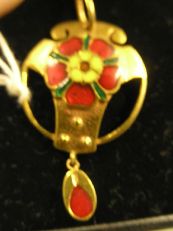 Appraisal: An Art Nouveau gilt metal and enamelled pendant rosette design