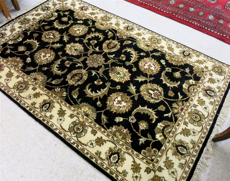 Appraisal: HAND KNOTTED ORIENTAL AREA RUG Indo-Persian overall scrolling floral raceme