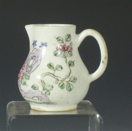 Appraisal: A Bow sparrow beak jug circa of pear shaped form