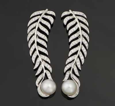 Appraisal: A Pair of Diamond and Pearl Feather Pendant Earrings by