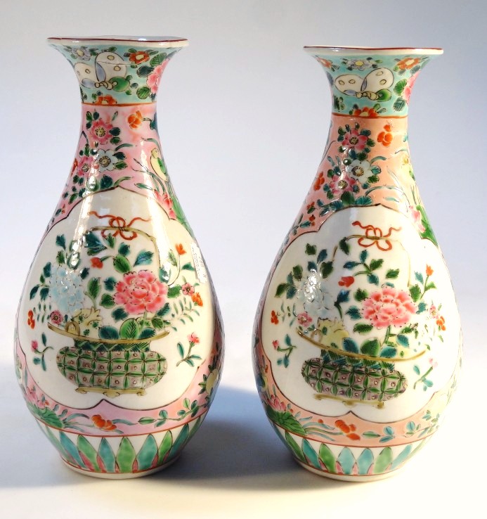 Appraisal: A pair of famille vert porcelain vases each circular body