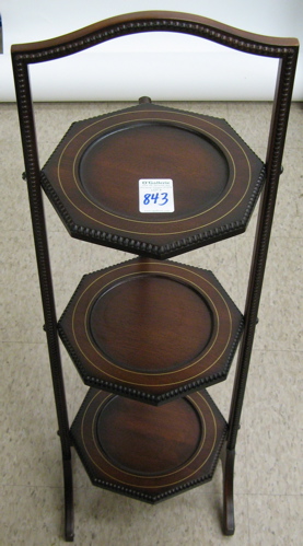 Appraisal: AN EDWARDIAN MAHOGANY PIE STAND English c the folding stand