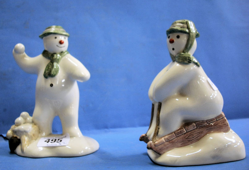 Appraisal: Royal Doulton Snowman Figures Tobogganing DS and Snowballing DS